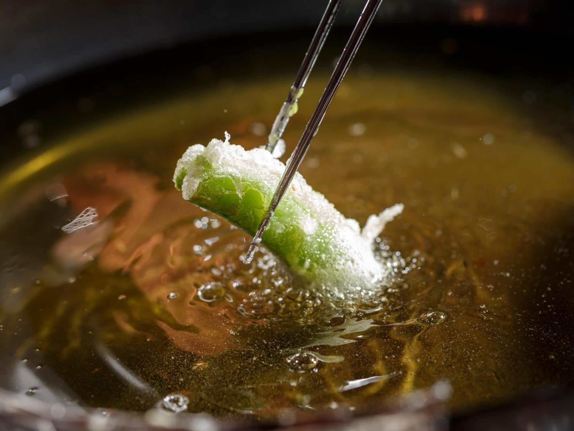 Hotel The Celestine Kyoto Gion Exteriör bild A spring roll being dipped in hot oil