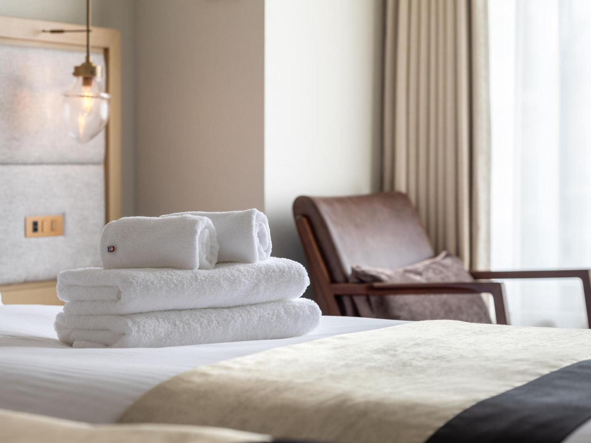Hotel The Celestine Kyoto Gion Exteriör bild A stack of towels on a bed